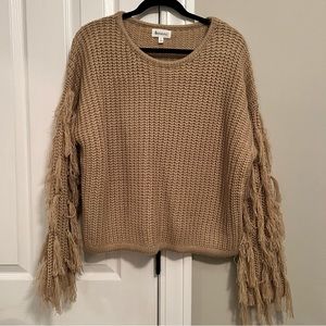 Chunky knit sweater with Tassle sleeve detail